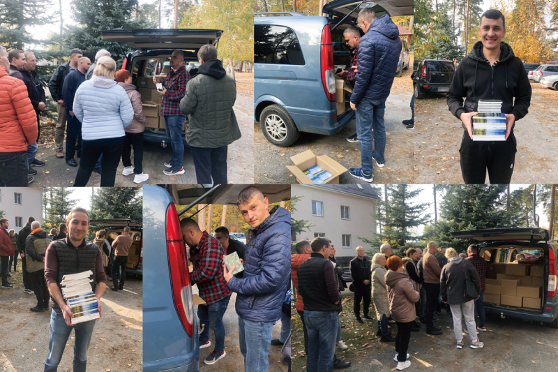 Ukrainian people receiving Bibles